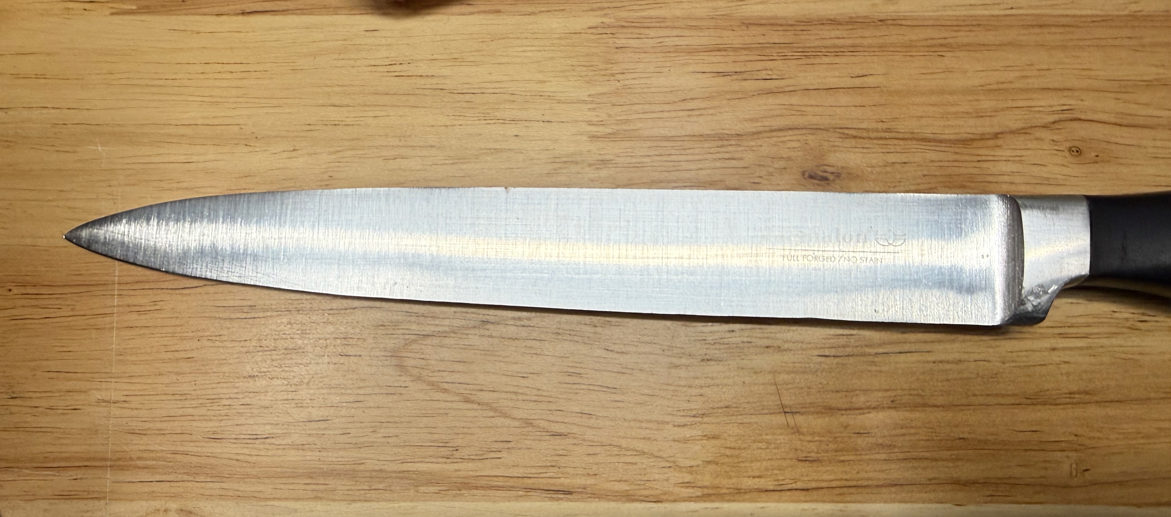 Carving knife after repair – side view